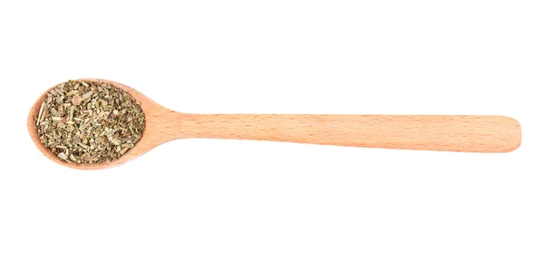 Dried oregano in spoon — Stock Photo, Image