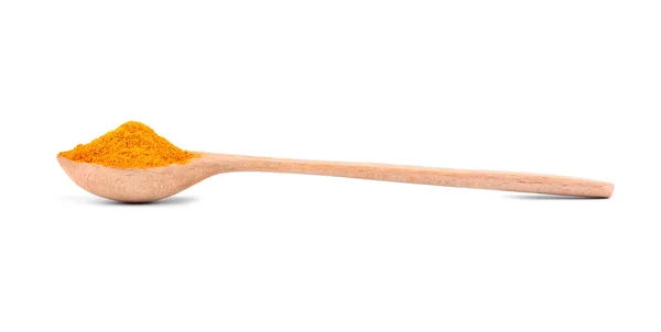 Powdered turmeric in spoon — Stock Photo, Image