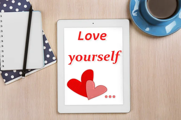 Tablet with text Love yourself