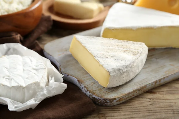 Cheese on kitchen table — Stock Photo, Image