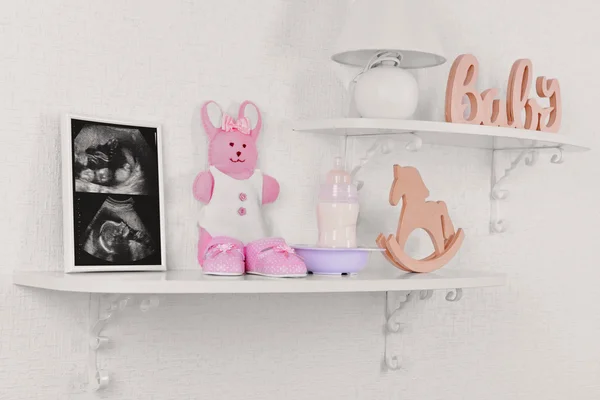 Photo frame with ultrasound scan of baby — Stock Photo, Image