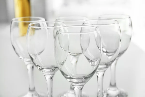 Wineglasses on  interior background — Stock Photo, Image