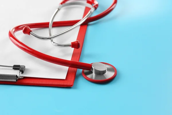 Red stethoscope and prescription — Stock Photo, Image