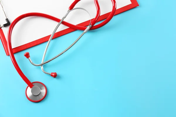 Red stethoscope and prescription — Stock Photo, Image