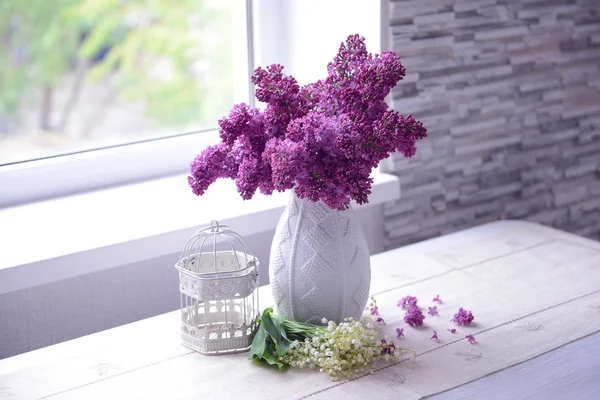 Lilac bouquet and may-lily flowers — Stock Photo, Image