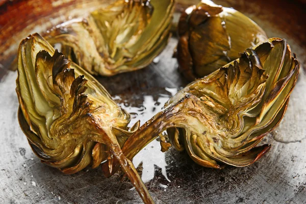Cooked artichokes on pan — Stock Photo, Image