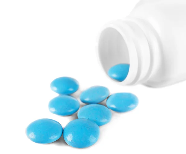 Niebieskie tabletki na tle — Zdjęcie stockowe
