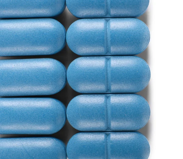 Pillole blu su sfondo — Foto Stock
