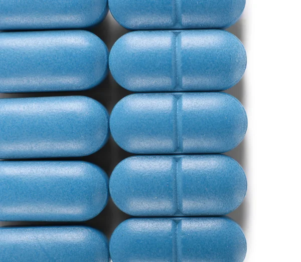 Pastillas azules en el fondo — Foto de Stock