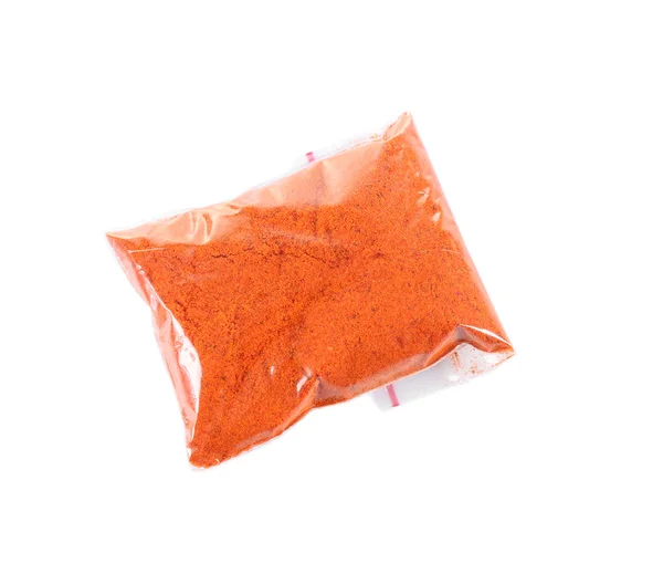 Powdered paprika in plastic zipper bag — Stock Photo, Image