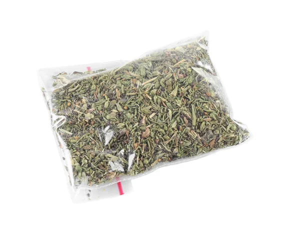 Dried tarragon in plastic zipper bag — Stock Photo, Image