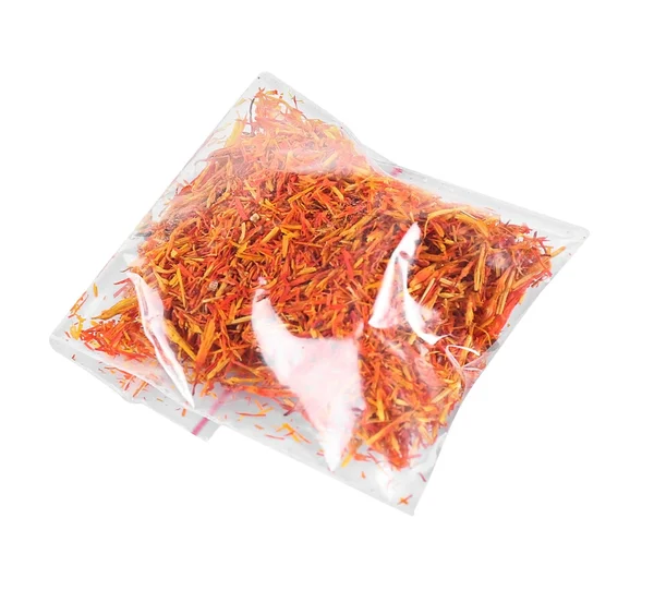 Dried saffron in plastic zipper bag — Stock Photo, Image