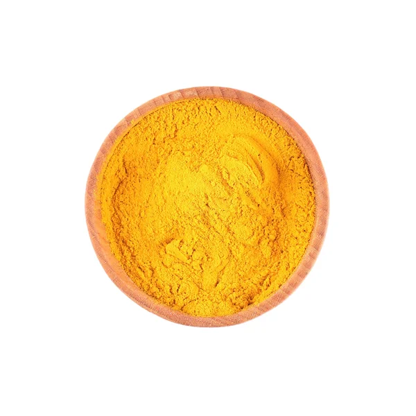 Powdered turmeric in small wooden bowl — Stock Photo, Image