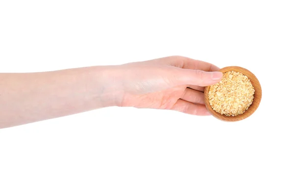 Hand holding bowl with chopped garlic — Stock Photo, Image