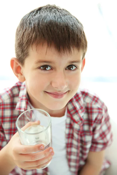 Cute boy drinking water Stock Photo