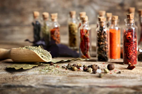 Wooden scoop with spices — Stock Photo, Image