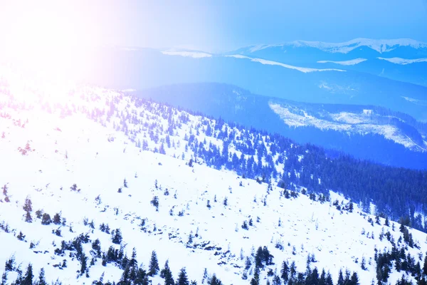 Snowy mountains in wintertime — Stock Photo, Image