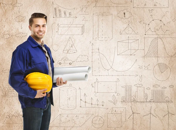 Ingeniero con planos y casco — Foto de Stock