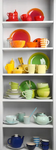 Tableware on shelves in the kitchen