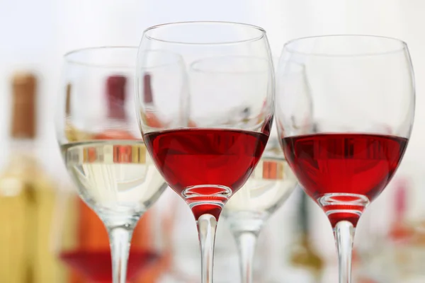 Glasses with red and white wine, — Stock Photo, Image
