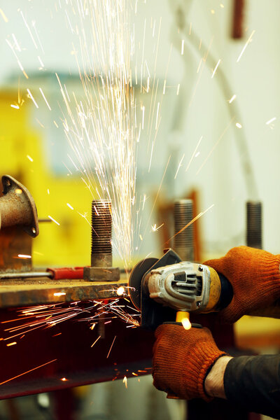 Man working with angle grinder