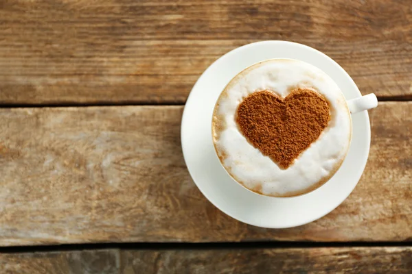 Csésze kávé kreatív mintával — Stock Fotó