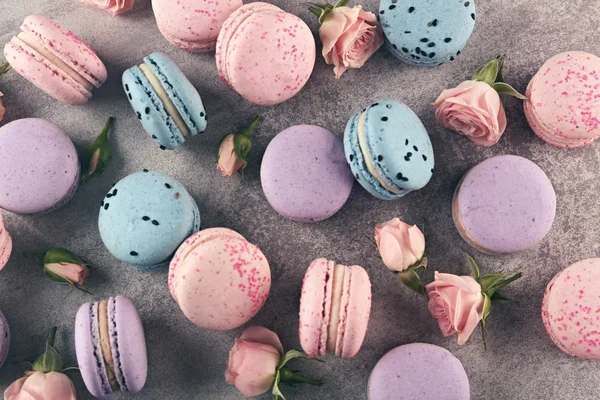 Tasty macaroons with beautiful roses