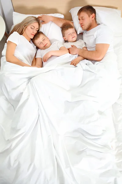 Lovely sleeping family in bed — Stock Photo, Image