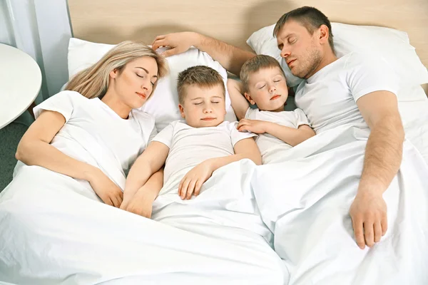 Lovely sleeping family in bed — Stock Photo, Image