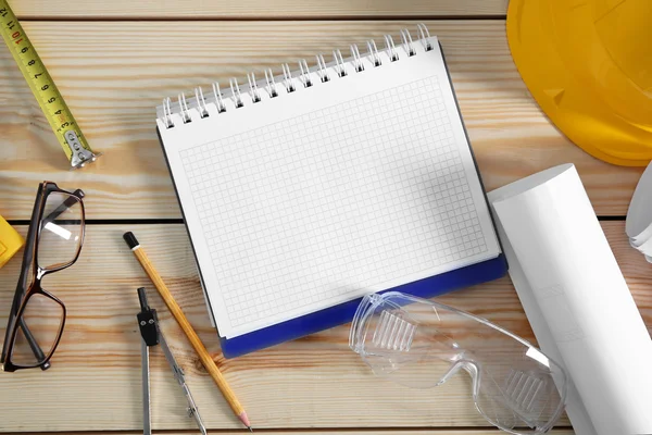 Notebook with construction tools — Stock Photo, Image