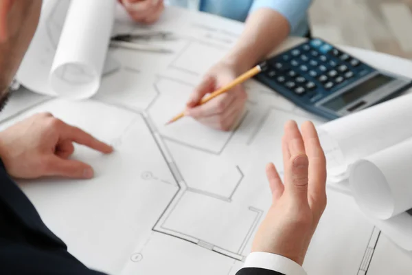 Engineers working with blueprints — Stock Photo, Image