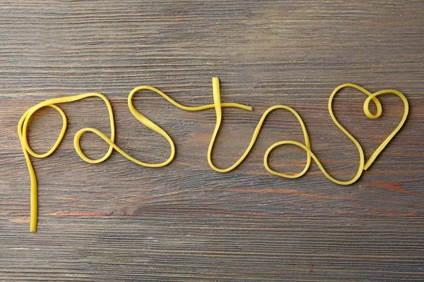 Word Pasta gemaakt van gekookte spaghetti — Stockfoto