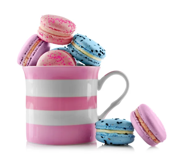 Tasty macaroons in cup — Stock Photo, Image