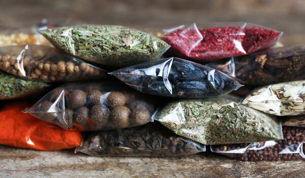 Different spices in plastic bags