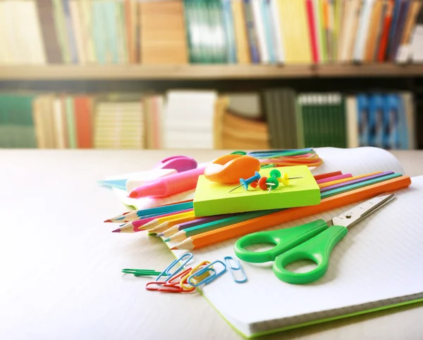 School supplies in library — Stock Photo, Image