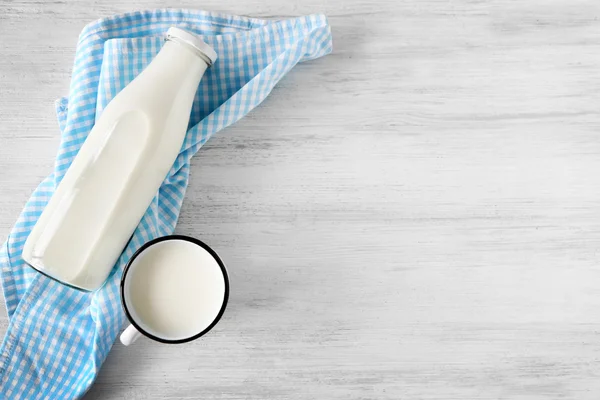 Milk with napkin on table — Stock Photo, Image