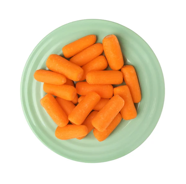 Дитяча морква в тарілці — стокове фото