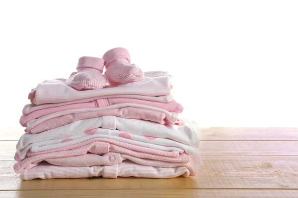 Stack of new baby clothes — Stock Photo, Image