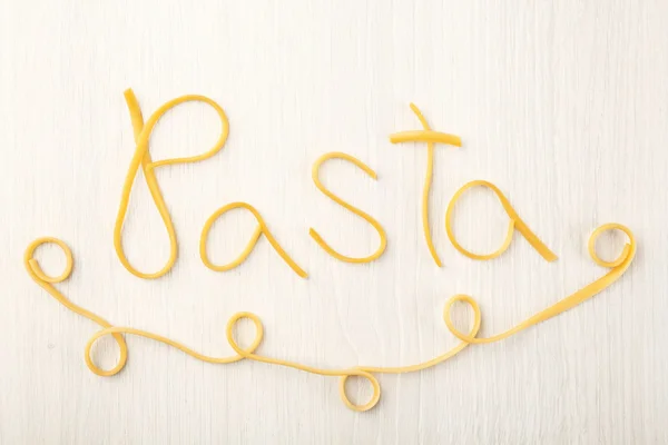 Palabra PASTA hecha de espaguetis cocidos — Foto de Stock
