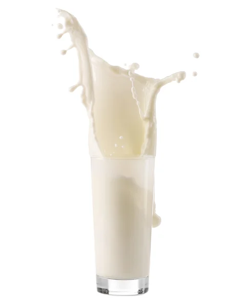 Vidro com leite salpicante — Fotografia de Stock