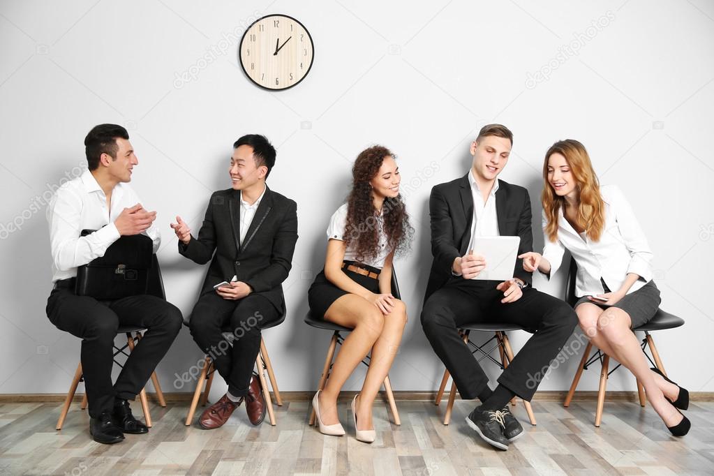 Group of people waiting for interview indoors