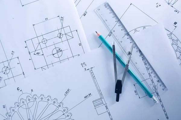 Set of engineering drawings with tools — Stock Photo, Image