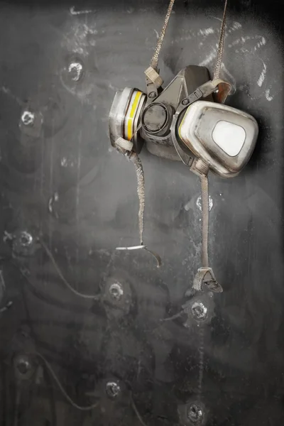 Respirator hanging on  surface — Stock Photo, Image