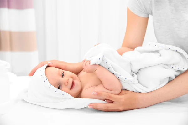 Mother and her little baby after bath in room — Stock Photo, Image