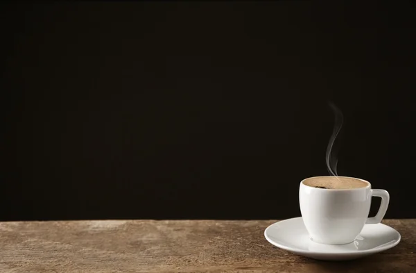 Cup of coffee with beans — Stock Photo, Image