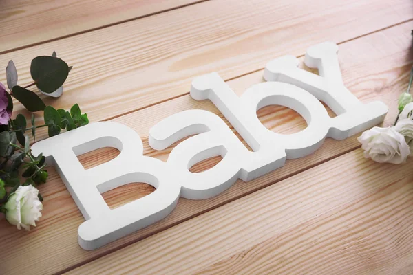 Word baby with roses — Stock Photo, Image