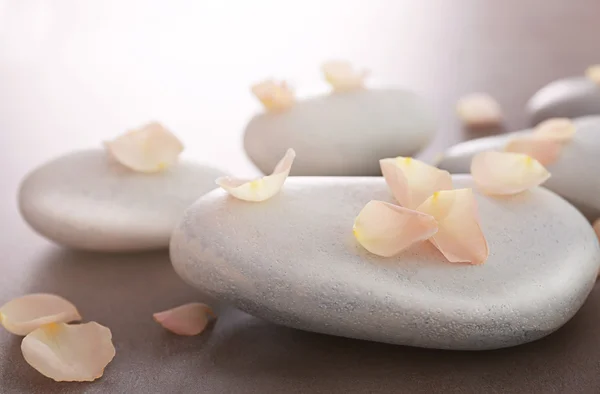 Spa stones with petals — Stock Photo, Image