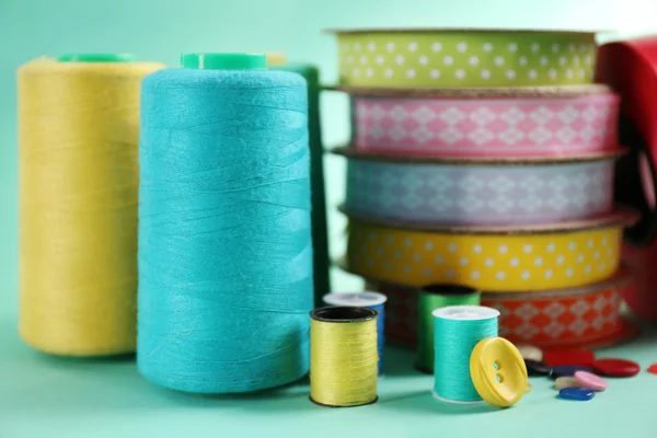 Many ribbons and sewing accessories — Stock Photo, Image