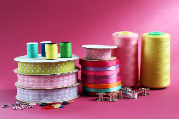 Many ribbons and sewing accessories — Stock Photo, Image