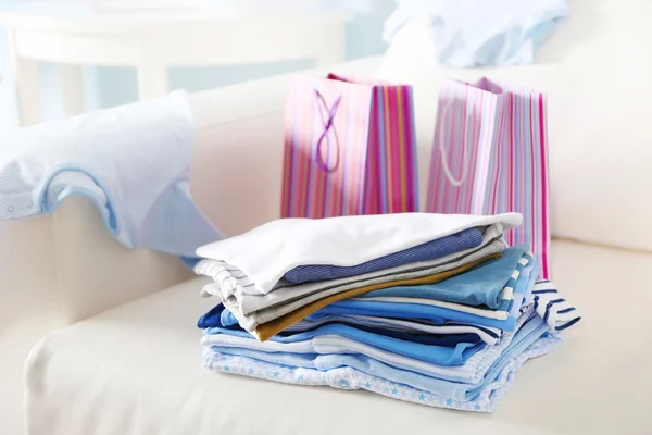 Pile of baby clothes — Stock Photo, Image